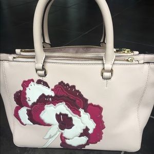 Tory Burch hand bag.